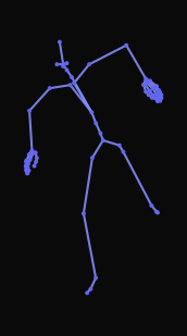 A person jumps forward over an obstacle, lifting their right leg high, lands on both feet, and walks forward before stopping.